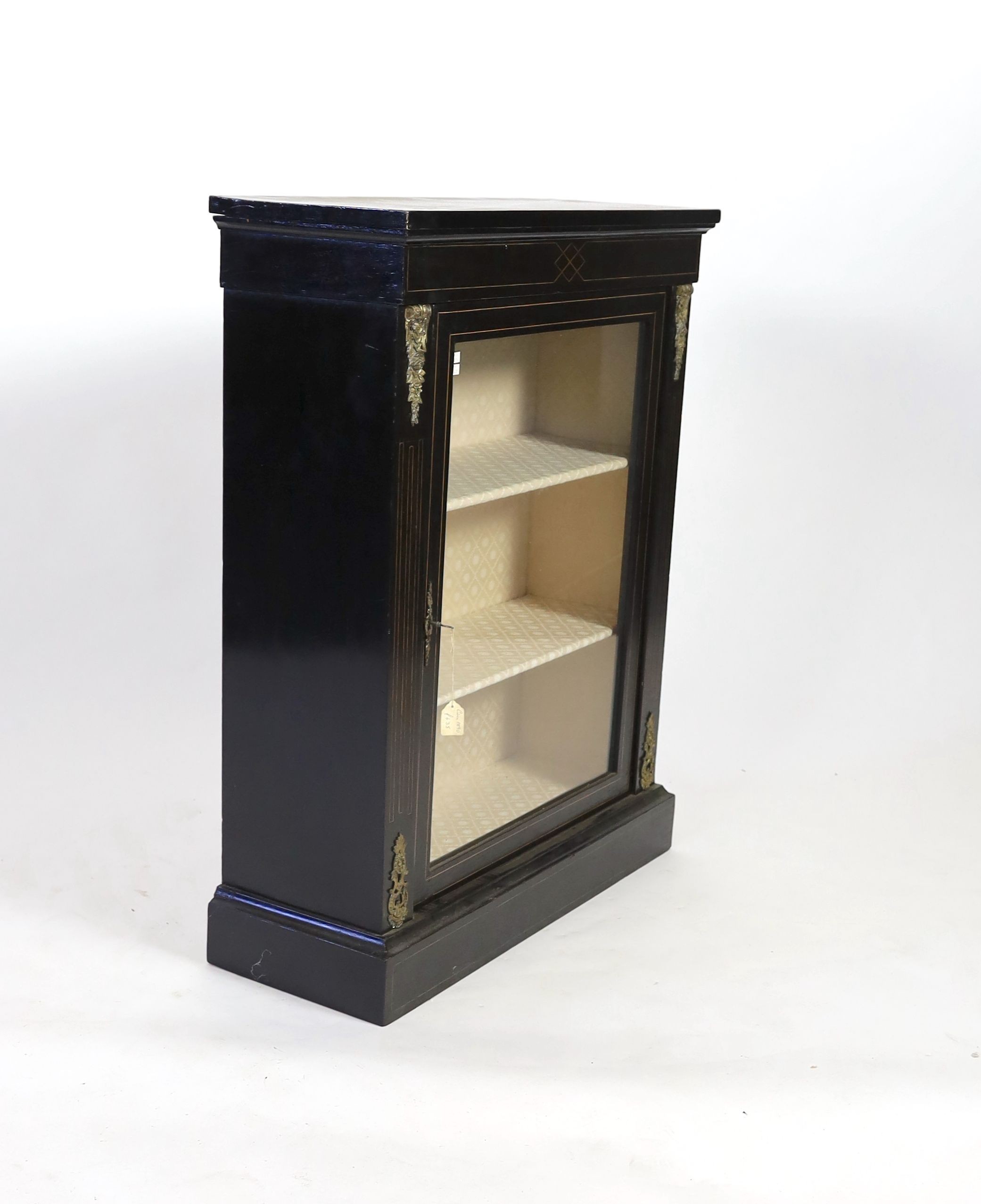 A Victorian gilt metal mounted ebonised pier cabinet, width 81cm depth 30cm height 104cm